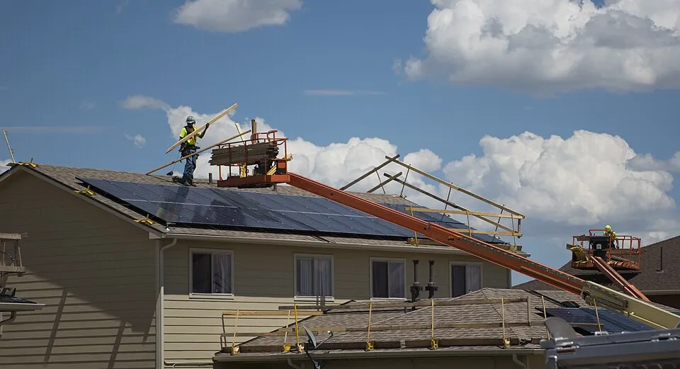 Roofing contractor working in a residential home